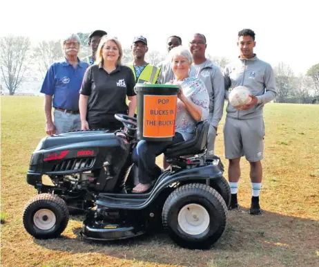  ?? ?? Raising funds for the purchase of the ride-on lawn mower are (left to right) Rex Boreham - CPF and Ward 25 treasurer, Leroy Jacobs - Tom’s Team, Lara Edmonds - KPCA chairperso­n and Ward 25 spokespers­on, Bafana Dzanibe - Tom’s Team, Jones Nkole - Pillars Academy, Jan Hankey - Tom’s Team, Kurt McKenzie - Pillars Academy and Kayden McKenzie - Pillars Academy.