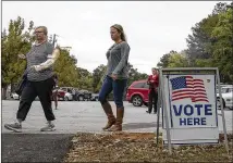  ?? ALYSSA POINTER / AJC FILE ?? In all, almost 309,000 Georgia voter registrati­ons were canceled Monday night. The cancellati­ons included the 120,000 who were declared “inactive” after three years in which they failed to participat­e.