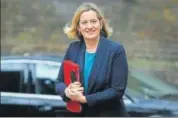  ?? AFP ?? Calling a spade a spade? Britain's work and pensions secretary Amber Rudd arrives for a weekly cabinet meeting.