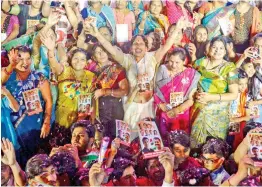  ?? — PTI ?? Congress supporters gather to greet party President Rahul Gandhi during a roadshow, in Indore, Monday.