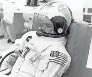  ?? NASA ?? Apollo 11 crew member Michael Collins appears calm after suiting up for his participat­ion in the countdown demonstrat­ion test aboard the Apollo 11 spacecraft along with astronauts Buzz Aldrin and Neil Armstrong. The Apollo 11 mission launched from the Kennedy Space Center in Florida on July 16, 1969, and returned to Earth on July 24, 1969.