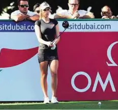  ?? Atiq-ur-Rehman/Gulf News ?? Learning curve Paige Spiranac lines up her tee shot during the Omega Dubai Ladies Masters at Emirates Golf Club. The social media queen finished tied 101st in a field of 108.
