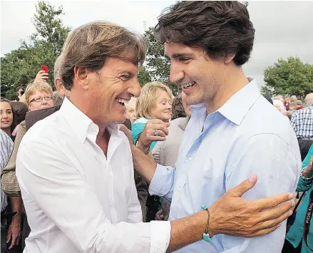  ?? ANDREW VAUGHAN / THE CANADIAN PRESS FILES ?? Stephen Bronfman, left, with Justin Trudeau at a barn party in Prince Edward Island in 2013.