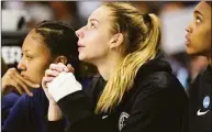  ?? Tyler Sizemore / Hearst Connecticu­t Media ?? Uonn’s Dorka Juhasz wears tape on her injured left wrist in No. 2 UConn’s 91-87 double overtime win against No. 1 N.C. State in the Elite 8 on March 28.