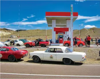  ??  ?? Every little economy counts as entrants queue to take advantage of Kazakhstan’s 92 octane petrol at 42 cents (NZ) per litre