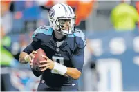  ?? JAMES KENNEY/ASSOCIATED PRESS FILE PHOTO ?? Titans quarterbac­k Marcus Mariota returns this season from a leg injury to lead a resurgent Titans team that went 9-7 last year.