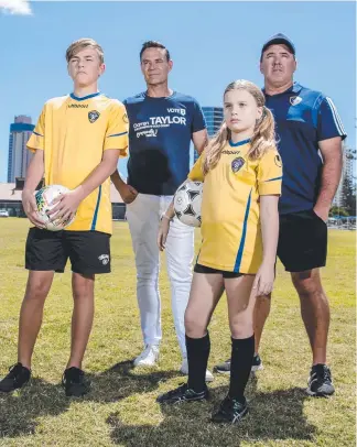  ?? Picture: JERAD WILLIAMS ?? Ethan Long, 16, Division 10 candidate Darren Taylor, Indiana McDonald, 10, and Broadbeach Soccer Club Juniors director Campbell Black.