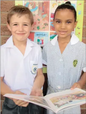  ??  ?? NEWBIES: Two excited Grade 1 learners, Christo Tredoux (left) and Emily Clayton, will start their school careers at St Patrick’s CBC today.