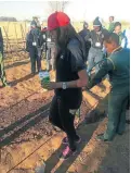  ??  ?? Dr Tiisetso Lephoto helps to teach Grade 12 pupils during the GoMaths winter school programme how to farm and have their own vegetable and fruit gardens in schools and at home.