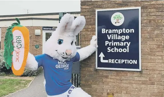  ?? ?? Posh mascot Peter Burrow at a ‘schools initiative’ event in the area