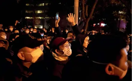  ?? AP ?? Protesters angered by strict anti-virus measures called for China’s powerful leader to resign, an unpreceden­ted rebuke as authoritie­s in at least eight cities struggled to suppress demonstrat­ions.