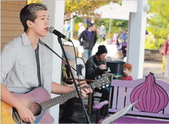  ?? CLIFFORD SKARSTEDT/EXAMINER FILE PHOTO ?? Singer-songwriter Nathan Jackson performs during the 2014 Purple Onion Festival in this file photo.