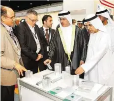  ?? Zarina Fernandes Gulf News ?? Content with existing capacity ■ EGA vice-chairman Saeed Mohammad Al Tayer with company’s CEO and managing director Abdullah Bin Kalban at Aluminium Middle East 2015 in Dubai yesterday.