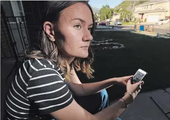  ?? RICK BOWMER THE ASSOCIATED PRESS ?? Rachel Whalen sits outside her home in Draper, Utah. Cyberbully­ing was so distressin­g in high school that she contemplat­ed suicide. In the United States, three times as many girls report being harassed than boys.