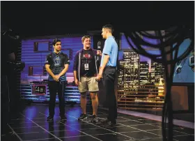  ?? Gabrielle Lurie / The Chronicle ?? Teammates Emiliano Benny (left) and Jacob McDowell (center) chat with reporter Alex Rodriguez during a televised e-sports video-game tournament.