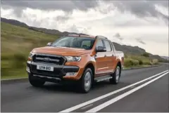  ?? FOTO: FORD ?? Ford Ranger dobbeltkab­ine er den amerikansk-inspirered­e høje flyder, der er en tand mindre end F150, som er den mest solgte bil i USA.