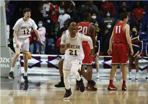  ?? Arkansas Democrat-Gazette/Thomas Metthe ?? Q Jonesboro’s Jesse Washington (21) celebrates after the final buzzer of Jonesboro’s 58-56 win over Maumelle in the Class 5A boys state basketball final Saturday at Bank OZK Arena.