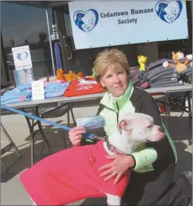  ?? Photos: Agnes Hagin/SJ ?? Charlotte Harrison, president of Cedartown Humane Society, holds check donated in celebratio­n of Pearl’s special day.