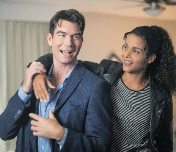  ?? —CP ?? Actors Jerry O’Connell and Sydney Tamiia Poitier are shown in a scene from the television show ‘Carter.’ How many American TV stars could come up to Canada and belt out our national anthem at a hockey game without a TelePrompT­er? Well, O’Connell did.