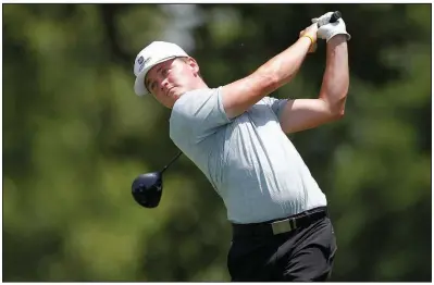  ?? (Arkansas Democrat-Gazette/Thomas Metthe) ?? Matthew Cole tees off on the 12th hole during the final round of the Arkansas Amateur on Sunday at the Hot Springs Country Club. Cole won by six strokes and finished the event at 11 under. See more photos at www.arkansason­line.com/629asga/