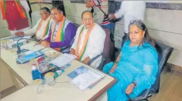  ?? HIMANSHU VYAS/HT PHOTO ?? (From right) Former CM Vasundhara Raje, BJP’S Rajasthan incharge Arun Singh, state president Satish Poonia and Leader of the Opposition Gulab Chand Kataria at the party’s core committee meeting in Jaipur on Tuesday.