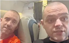  ?? ?? Aiden Aslin, 28, right, and 48-yearold Shaun Pinner share a selfie on their flight home, after a release said to have been brokered by Saudi Arabia’s Crown Prince, Mohammed bin Salman