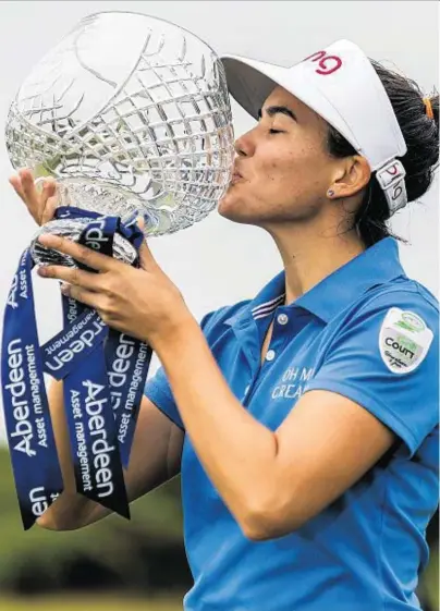  ??  ?? SEALED: France’s Isabelle Boineau celebrates her Scottish Women’s Open triumph