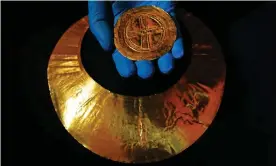  ?? Photograph: Victoria Jones/PA ?? A portable sun disc, dated 2400–2000BC, which will be on display in the World of Stonehenge exhibition.