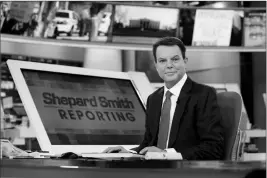  ?? ASSOCIATED PRESS ?? IN THIS JAN. 30, 2017, FILE PHOTO, Fox News Channel chief news anchor Shepard Smith (left) on The Fox News Deck before his “Shepard Smith Reporting” program, in New York.