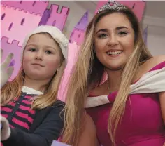  ??  ?? Sinead Kehoe with Sleeping Beauty at the opening of Santa’s Enchanted Castle in Enniscorth­y. See No 6