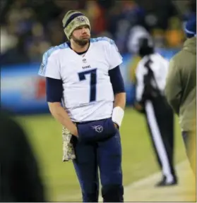  ?? WADE PAYNE — THE ASSOCIATED PRESS ?? Tennessee Titans quarterbac­k Zach Mettenberg­er may not be Aaron Rodgers, but he could dangerous if the Eagles don’t show up this afternoon.