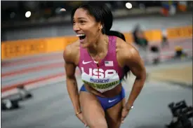  ?? BERNAT ARMANGUE — THE ASSOCIATED PRESS ?? Tara Davis-Woodhall, of the United States, reacts after winning the gold medal in the women’s long jump during the World Athletics Indoor Championsh­ips at the Emirates Arena in Glasgow, Scotland, Sunday, March 3, 2024.