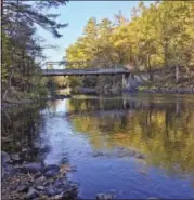  ?? MARY ESCH - THE ASSOCIATED PRESS ?? Local officials have wanted to replace this old bridge over the Schroon River in Piseco Lake since 2009, bu plans for a new bridge by the state constituti­onal protection of Forest Preserve land.