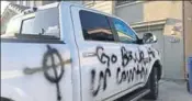  ??  ?? The racist message was spraypaint­ed on the victim’s car, alongside an image of a Celtic Cross, one of the most commonly used white supremacis­t symbols. FACEBOOK/CASEY JOYCE MUSGRAVE