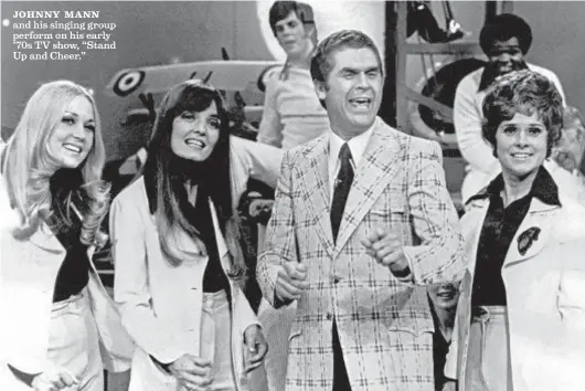  ?? Los Angeles Times archives ?? JOHNNY MANN and his singing group perform on his early ’70s TV show, “Stand Up and Cheer.”