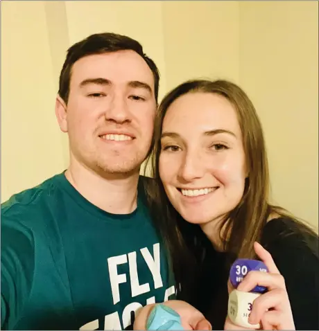  ?? SUSIE HAWKINS / SUBMITTED PHOTO ?? Chris Hibbs and Susie Hawkins with their exercise dice they use for weekly workouts.