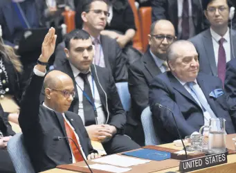  ?? ?? U.S. Deputy Ambassador to the U.N. Robert Wood votes against a resolution allowing Palestinia­n U.N. membership at United Nations headquarte­rs, New York, U.S., April 18, 2024.