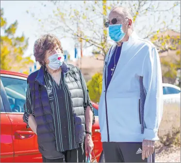  ?? Rachel Aston Las Vegas Review-journal @rookie__rae ?? Sandra Hahnenkrat­t and husband Ronald Griebell talk Thursday about being stuck in quarantine on a cruise ship off the California coast almost a year ago and getting their second doses of the COVID-19 vaccine.