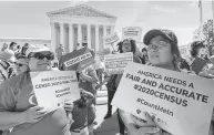  ?? J. Scott Applewhite / Associated Press ?? Immigratio­n activists rally outside the Supreme Court against a citizenshi­p census question on April 23.