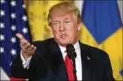  ?? EVAN VUCCI / ASSOCIATED PRESS ?? President Donald Trump speaks to reporters Tuesday in the East Room of the White House during a news conference with Swedish Prime Minister Stefan Lofven.