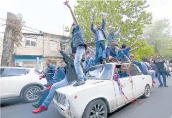  ?? Picture / AP ?? Armenians took to the streets of Yerevan to celebrate after Serzh Sargsyan resigned.