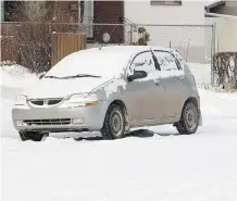  ?? GREG SOUTHAM ?? A car that matches the descriptio­n of one driven by a man involved in a road rage incident on Tuesday morning sits in the Ottewell neighbourh­ood of Edmonton on Wednesday.