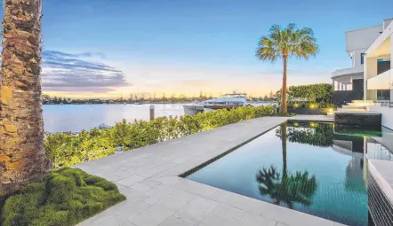  ??  ?? This mega-mansion at 38 Brittanic Cres, Sovereign Islands has had its price dropped by almost $2 million.