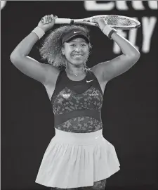  ?? ANDY BROWNBILL/AP PHOTO ?? Japan’s Naomi Osaka celebrates after defeating Jennifer Brady of the United States 6-4, 6-3 in the women’s singles final of the Australian Open on Saturday in Melbourne.