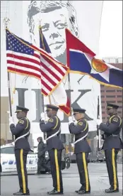  ?? RODGER MALLISON / MCT ?? The Dallas Police Honor Guard participat­es in “The 50th: Honoring the Memory of President John F. Kennedy” event downtown. It was the city’s first official JFK memorial event at Dealey Plaza, site of the tragedy on Nov. 22, 1963.