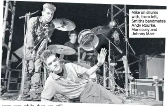  ??  ?? Mike on drums with, from left, Smiths bandmates Andy Rourke, Morrissey and Johnny Marr