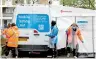  ??  ?? NHS workers seen next to a coronaviru­s mobile testing unit(reuters)