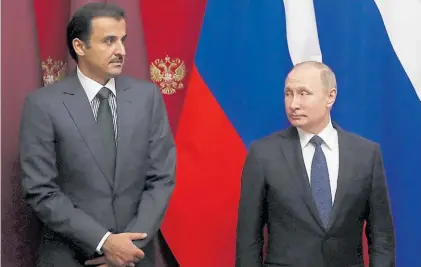  ?? REUTERS ?? Visita. El emir de Qatar, A Thani, y el presidente de Rusia, Vladimir Putin, ayer en el Kremlin.