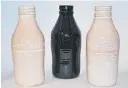  ??  ?? Paul Maseyk ceramic milk bottles from Piece Gallery, Matakana.