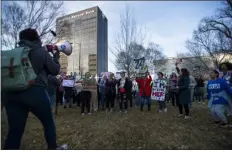  ?? AP PHOTO/JUSTIN REX ?? People gather in front of the J. Marvin Jones Federal Building and Mary Lou Robinson United States Courthouse to protest a lawsuit to ban the abortion drug mifepristo­ne Saturday, Feb. 11, 2023, in Amarillo, Texas.